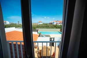 Balkón nebo terasa v ubytování Alex Surf Hostel