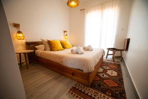 Postel nebo postele na pokoji v ubytování Alex Surf Hostel