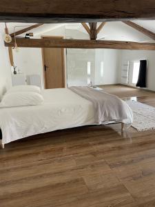 Кровать или кровати в номере Maison de Felix