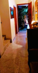 a room with a hallway with a door and a floor at MAKIS STUDIOS KATELIOS in Katelios +4 photos