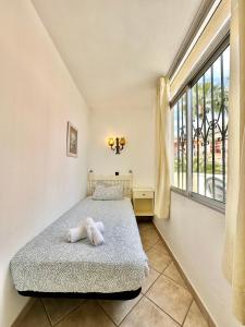 Łóżko lub łóżka w pokoju w obiekcie California Sweet Home