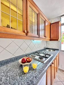Kuchnia lub aneks kuchenny w obiekcie California Sweet Home