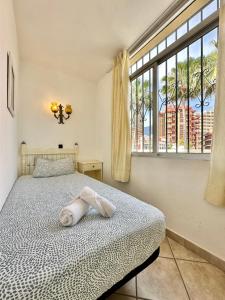 Łóżko lub łóżka w pokoju w obiekcie California Sweet Home