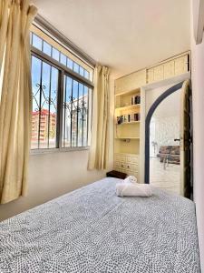 Łóżko lub łóżka w pokoju w obiekcie California Sweet Home