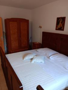 Postel nebo postele na pokoji v ubytování Guest House Lucijo