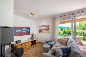 Μια τηλεόραση ή/και κέντρο ψυχαγωγίας στο Ferienhaus Kitezeit