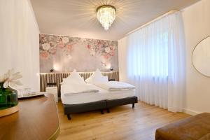 Postel nebo postele na pokoji v ubytování Hotel Zehnthof