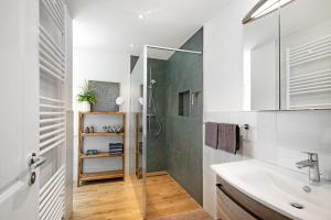 Ένα μπάνιο στο Ferienhaus Weltenbummler +34 φωτογραφίες