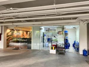 a store front of a store with a glass door at Grand stay in Cebu City +12 photos