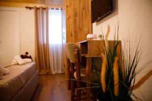 TV a/nebo společenská místnost v ubytování Guva Guest House