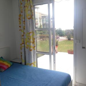 Ένα ή περισσότερα κρεβάτια σε δωμάτιο στο Esterel Home +26 φωτογραφίες