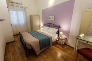 Postel nebo postele na pokoji v ubytování Onlyrooms III - Real City Center