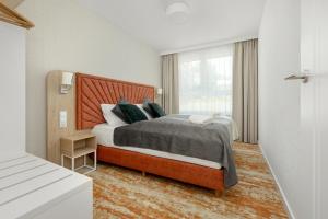 Postelja oz. postelje v sobi nastanitve Sun & Beach Apartments Bel Mare with Parking by Renters