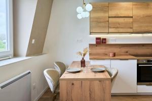 Photo de la galerie de l'établissement T2-spacieux-lumineux, à Mons-en-Baroeul 12 autres photos