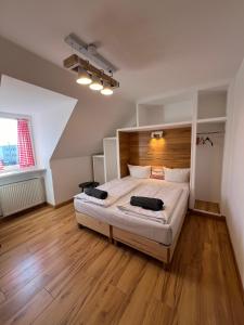 Postel nebo postele na pokoji v ubytování Runas Hotel