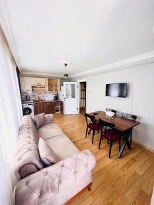 Kuchyň nebo kuchyňský kout v ubytování Gür Apartment