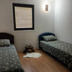 Postel nebo postele na pokoji v ubytování Camp Krivace