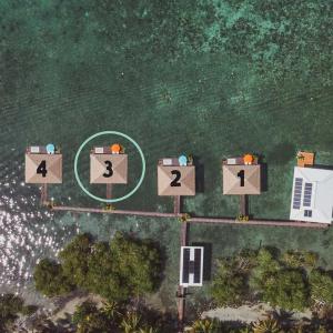 an overhead view of a street with signs in the ocean at Sol Bungalows Bocas del Toro in Bocas del Toro