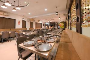 Restoran või mõni muu söögikoht majutusasutuses Hotel Krishna Inn, Aurangabad