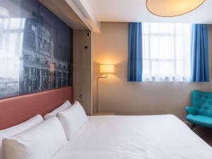 Postel nebo postele na pokoji v ubytování Aparthotel Adagio Liverpool City Centre