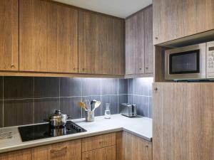Kuchyň nebo kuchyňský kout v ubytování Aparthotel Adagio Liverpool City Centre