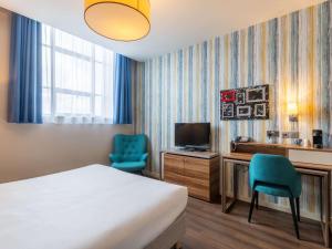 TV a/nebo společenská místnost v ubytování Aparthotel Adagio Liverpool City Centre