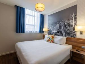 Postel nebo postele na pokoji v ubytování Aparthotel Adagio Liverpool City Centre