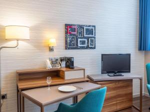 TV a/nebo společenská místnost v ubytování Aparthotel Adagio Liverpool City Centre
