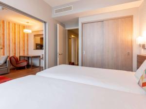 Postel nebo postele na pokoji v ubytování Aparthotel Adagio Liverpool City Centre