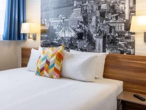 Postel nebo postele na pokoji v ubytování Aparthotel Adagio Liverpool City Centre
