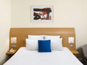 Postel nebo postele na pokoji v ubytování Novotel Budapest Danube