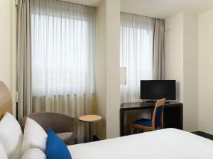 TV a/nebo společenská místnost v ubytování Novotel Budapest Danube