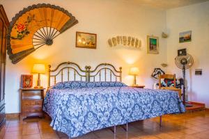 A bed or beds in a room at Villa La Voce Del Vento