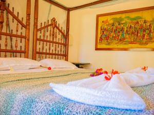 Postel nebo postele na pokoji v ubytování Tembo Cozy Apartments + 28 fotografií