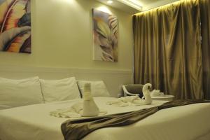 Voodi või voodid majutusasutuse Salma Hotel Cairo toas