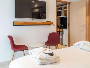Postelja oz. postelje v sobi nastanitve Mercure Avignon Gare TGV