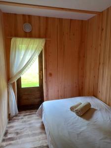 Llit o llits en una habitació de Vastseliina Metskond Camping