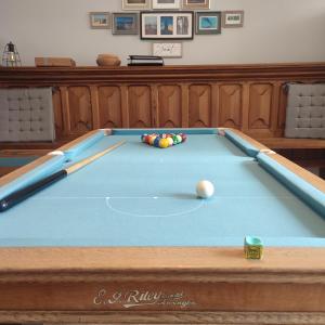 a pool table with a ball in the middle of it at Unique and Stylish close to Beaches Restaurants Shops in Cleethorpes