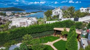 an aerial view of a house with a garden at Villa M Cako in Ksamil
