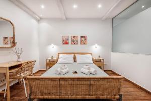 Ένα ή περισσότερα κρεβάτια σε δωμάτιο στο Saint's Alley Suite