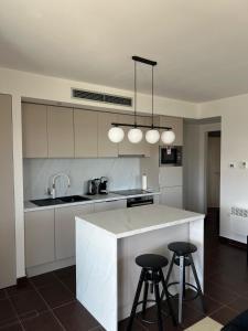 Kitchen o kitchenette sa Vitas Apartments