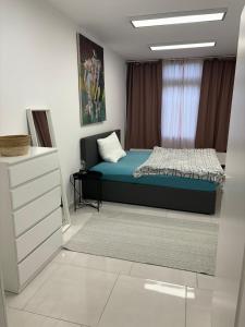 Posteľ alebo postele v izbe v ubytovaní Stadtsuite mit Sauna in Wiener Neustadt 135 m2
