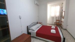 Ένα ή περισσότερα κρεβάτια σε δωμάτιο στο Marty's home