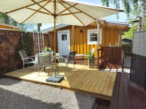 Patio nebo venkovní prostory v ubytování Lilla Stugan, Sjötorp