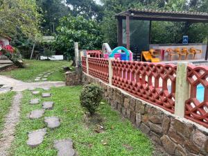 Gallery image of Pousada Recanto do Zeca casa1 in Praia Grande +15 photos