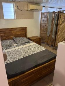 Postel nebo postele na pokoji v ubytování Acacies D