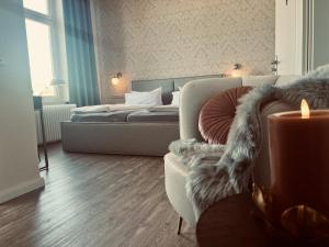 Postel nebo postele na pokoji v ubytování Lexow - Hotel an de Havenkant