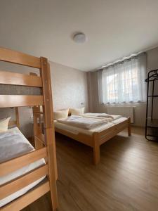 Llit o llits en una habitació de Apartments Marianna