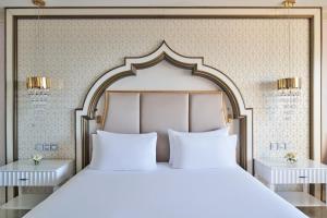 Postel nebo postele na pokoji v ubytování Rixos Premium Saadiyat Island - All Inclusive