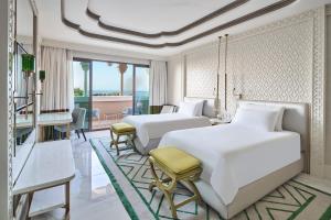 Postel nebo postele na pokoji v ubytování Rixos Premium Saadiyat Island - All Inclusive